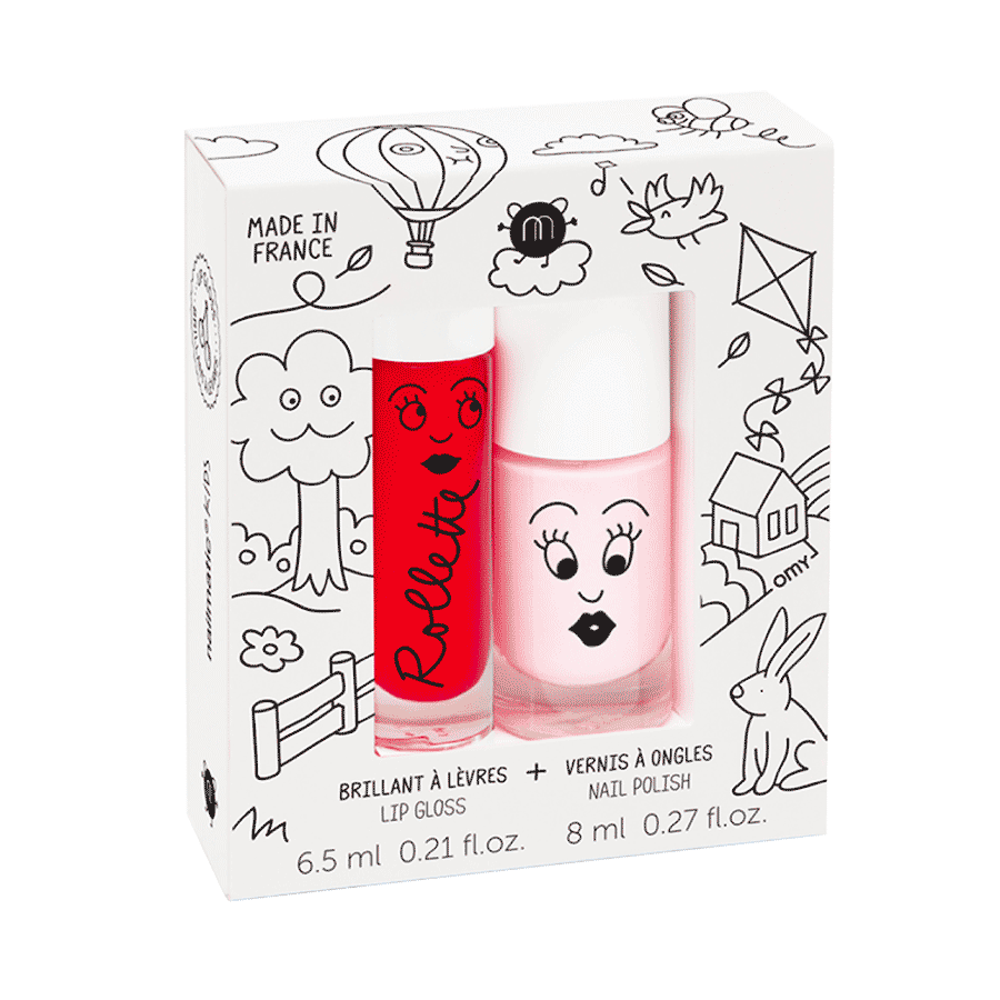 Cottage cadeauset met rode rollerball lipgloss en roze nagellak in een witte verpakking met speelse tekeningen.