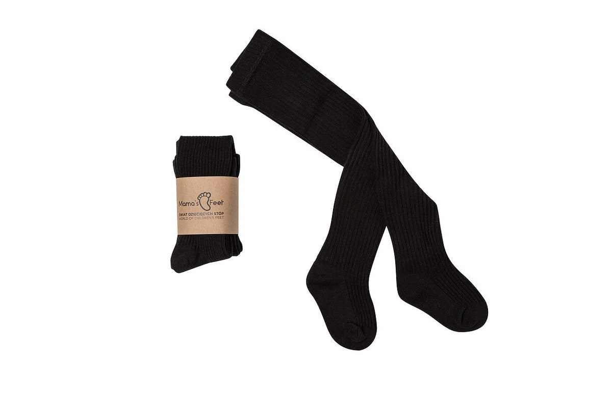 Zwarte Maillot Classic van Mama's Feet met ribstructuur, uitgevouwen en opgevouwen met een papieren wikkel.
