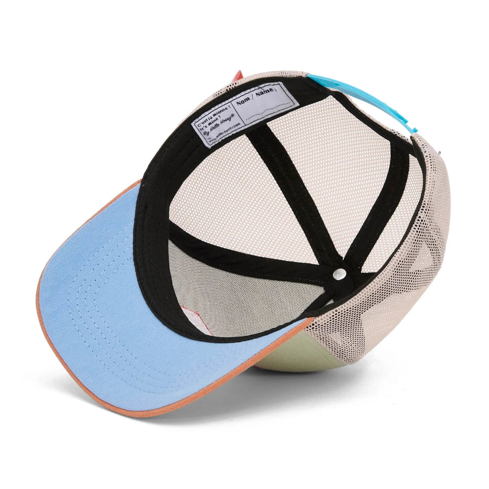 Binnenkant van de Mini Anis pet met zwarte banden, beige mesh en lichtblauwe onderkant van de klep.