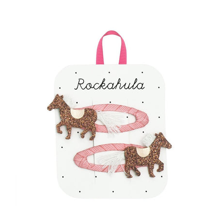 Twee roze Pippa Pony-haarclips met bruine glitterpaardjes, roze zadels en witte manen en staarten