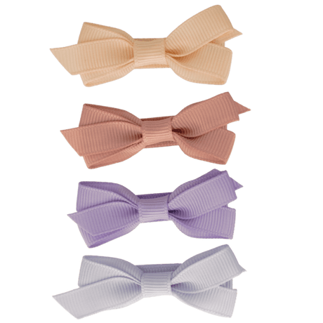 Vier haarspeldjes met geribbelde strik in pastelkleuren: perzik, oudroze, lila en lichtblauw.