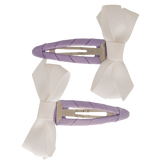 Twee lila haarspeldjes Twist en Strik met witte strikjes, in de kleur Lilac Fever.