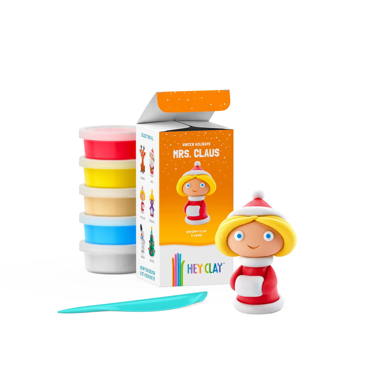 Hey Clay kerstvrouw in rood-witte outfit met gele haren, naast de verpakking, vijf potjes klei en boetseergereedschap.