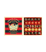 Pirate Treasure-knikkers in rood, zwart en goud, gesorteerd in een open doos naast het deksel met piratenschedel.