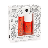 Tropical cadeauset met lipgloss en oranje nagellak in een witte doos met zwart-witte tekeningen.