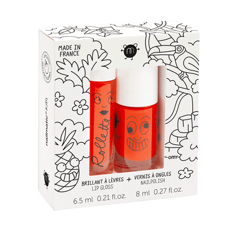 Tropical cadeauset met lipgloss en oranje nagellak in een witte doos met zwart-witte tekeningen.