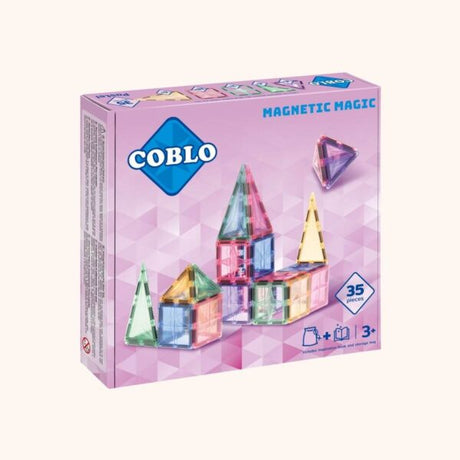 Roze Coblo-verpakking met 35 magnetische bouwblokken in pastelkleuren en een voorbeeldbouwwerk.