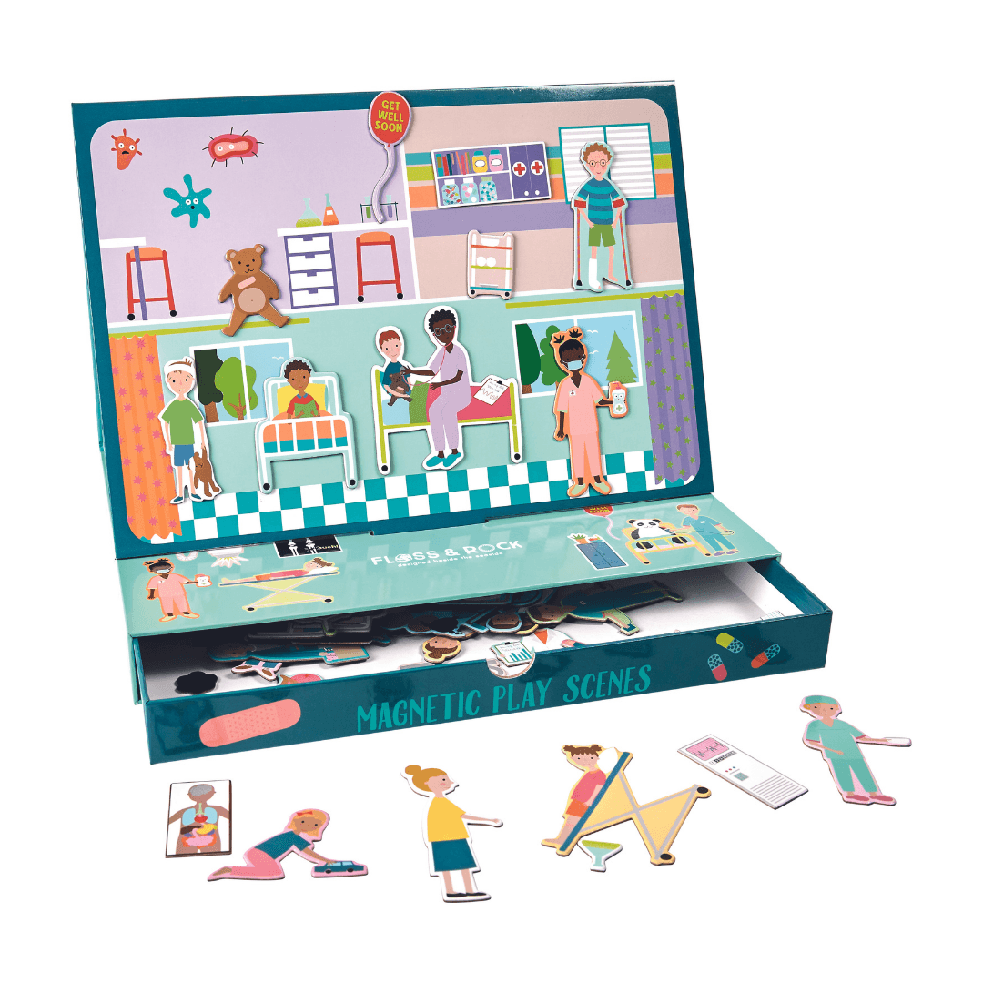 Open magnetische puzzeldoos met ziekenhuiskamers, figuurtjes en een uitgeschoven opberglade.
