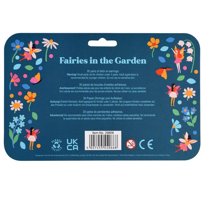 Achterkant van de verpakking van oorstickers met feeën en bloemen op een donkerblauwe achtergrond.