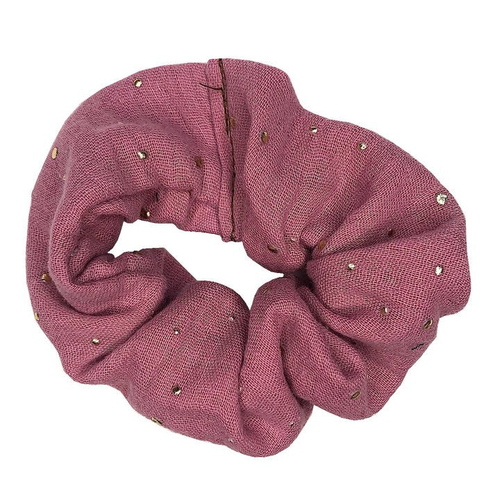 Oudroze scrunchie van hydrofiel katoen met gouden spatjes.