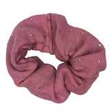 Oudroze scrunchie van hydrofiel katoen met gouden spatjes.
