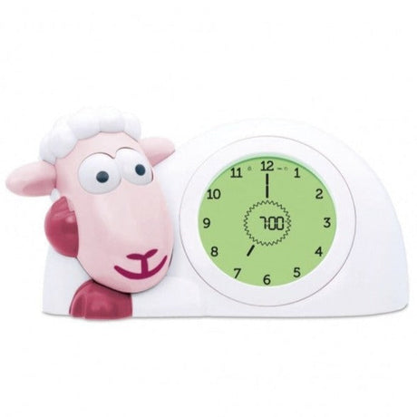 Roze slaaptrainer Sam met open ogen, witte behuizing en groene wijzerplaat.