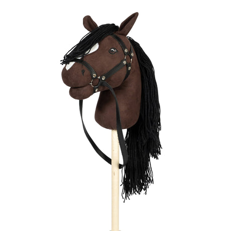 Bruin stokpaardje met lange zwarte manen, witte bles, open mond en zwart hoofdstel.