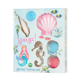 Verpakking van de zeemeermin glittertattooset met zeefiguren en blauwe en roze glitters.