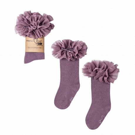 Paarse tutu kniekousen van Mama's Feet met brede ruches aan de bovenkant, los en met verpakking.