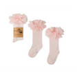 Lichtroze Tutu kniekousen van Mama's Feet met brede ruches aan de bovenkant, los en met verpakking.
