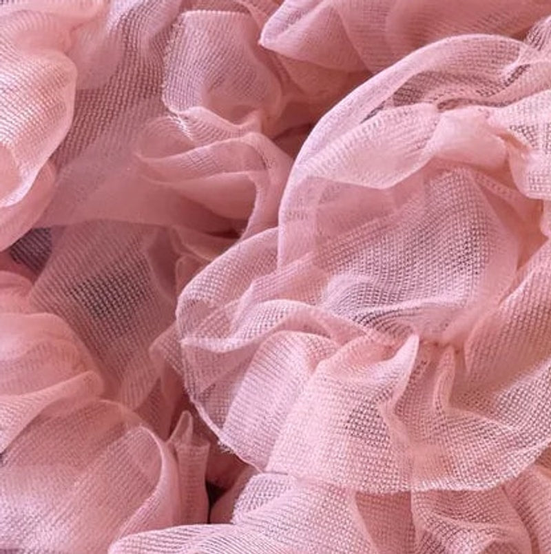 Detail van de roze Tutu Rok Loli met golvende laagjes tule.